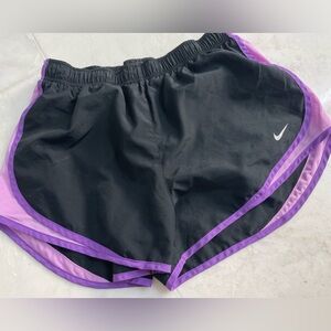 Nike dry fit women’s shorts size large, black purple gently used